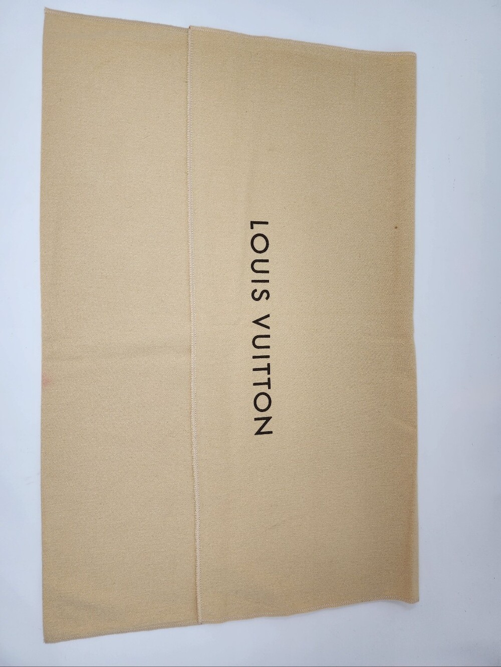 Authentic Louis Vuitton dust bag.